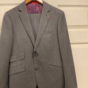 Moores suite  only worn once  jacket size 36s pants size 29 waist colour gray